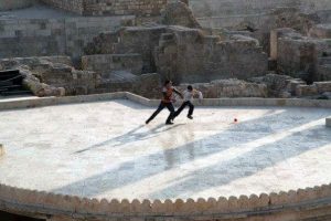 The children playing football on a little field in Aleppo, Syria